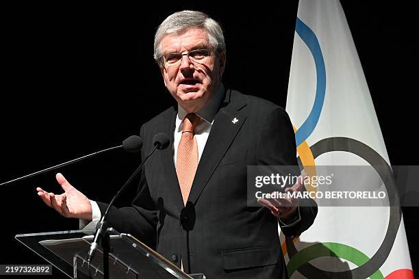 The President of the International Olympic Committee Thomas Bach attends a ceremony to mark one year until the start of Milano Cortina Olympics in...