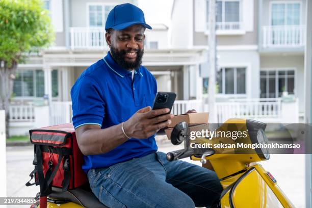 African Delivery Rider 123 African Delivery Motorbike Stock Photos, High-Res Pictures, and ...