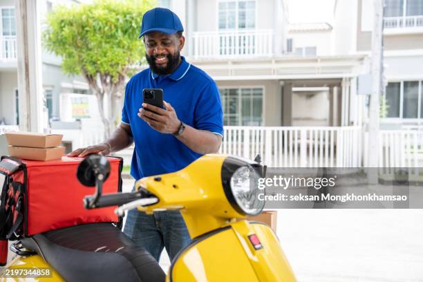 African Delivery Rider 124 African Delivery Motorbike Stock Photos, High-Res Pictures, and ...