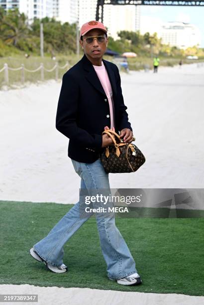 Pharrell Williams is seen arriving at the JP Morgan event on February 6, 2025 in Miami Beach, Florida.