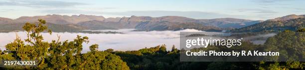 cloud inversion over lake windermere from orrest head, lake district, england - panoramic stock pictures, royalty-free photos & images