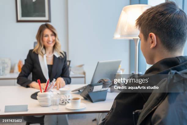 loan officer meeting with student - financial aid stock pictures, royalty-free photos & images