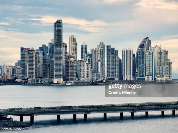 panama bay cityscape panama city in sunrise light - panama stock pictures, royalty-free photos & images
