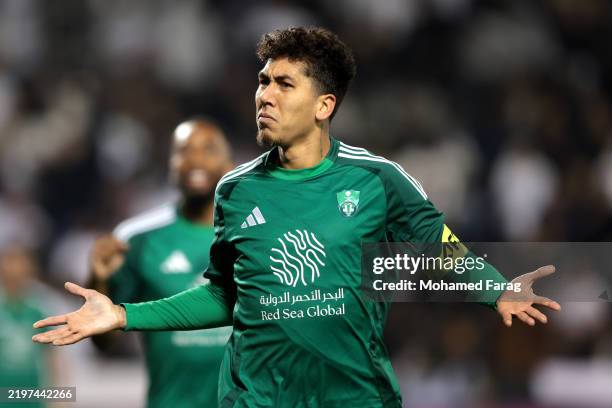 Roberto Firmino of Al-Ahli Saudi celebrates scoring his team's first goal during the AFC Champions League Elite match between Al-Sadd and Al-Ahli at...