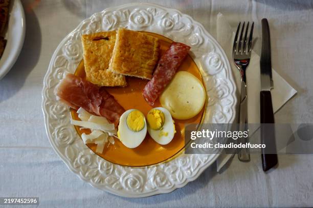appetizer with rustic pie, cheese, hard boiled eggs, ham and salami - hard salami stock pictures, royalty-free photos & images