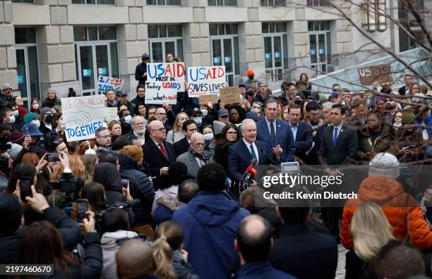 Sen. Chris Van Hollen and Rep. Gerry Connolly , joined by fellow lawmakers and employees and supporters of U.S. Agency for International Development...