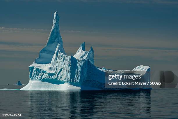 scenic view of frozen sea against sky - greenland glacier stock pictures, royalty-free photos & images