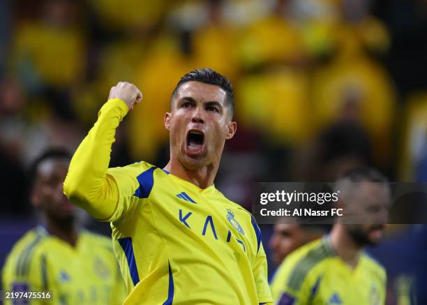 Cristiano Ronaldo of Al Nassr celebrates after scoring the third goal of his team during the AFC Champions League Elite match between Al-Nassr and Al...