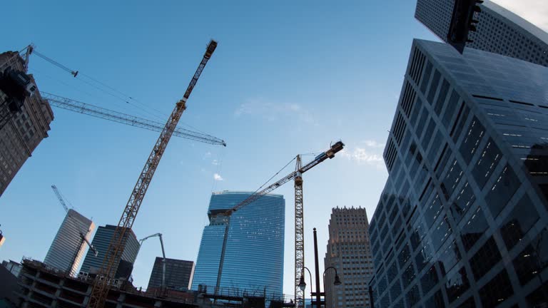 https://media.gettyimages.com/id/2197483804/video/downtown-cranes-building-skyscrapers.jpg?b=1&s=640x640&k=20&c=Vq_To00o1YHjkQZjCfRctATZLc90LUGyJW72Aeq5KMg=