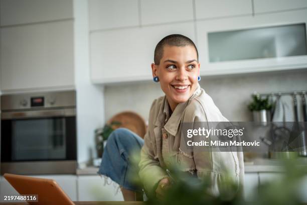 portrait of a young woman with short hair - short hair stock pictures, royalty-free photos & images