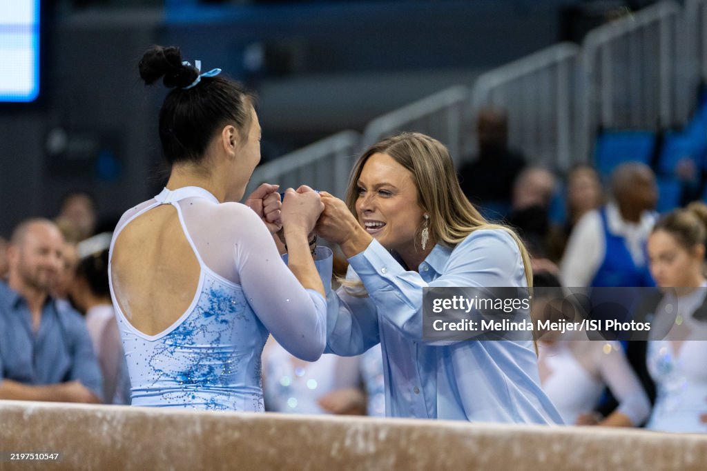 Emily Raber Ucla Emily Lee of the UCLA Bruins Gymnastics speaks with Lacy Degan before ...