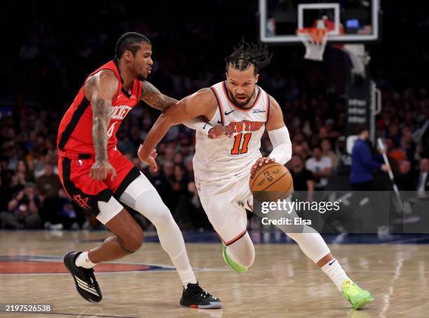 Jalen Brunson of the New York Knicks heads for the net as Jalen Green of the Houston Rockets defends at Madison Square Garden on February 03, 2025 in...