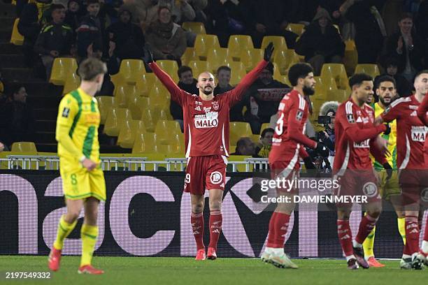 Brest's French forward Ludovic Ajorque celebrates scoring his team's first goal during the French L1 football match between FC Nantes and Stade...