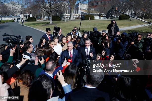Middle East Envoy Steve Witkoff and United States National Security Adviser Michael Waltz speak to reporters outside of the West Wing of the White...