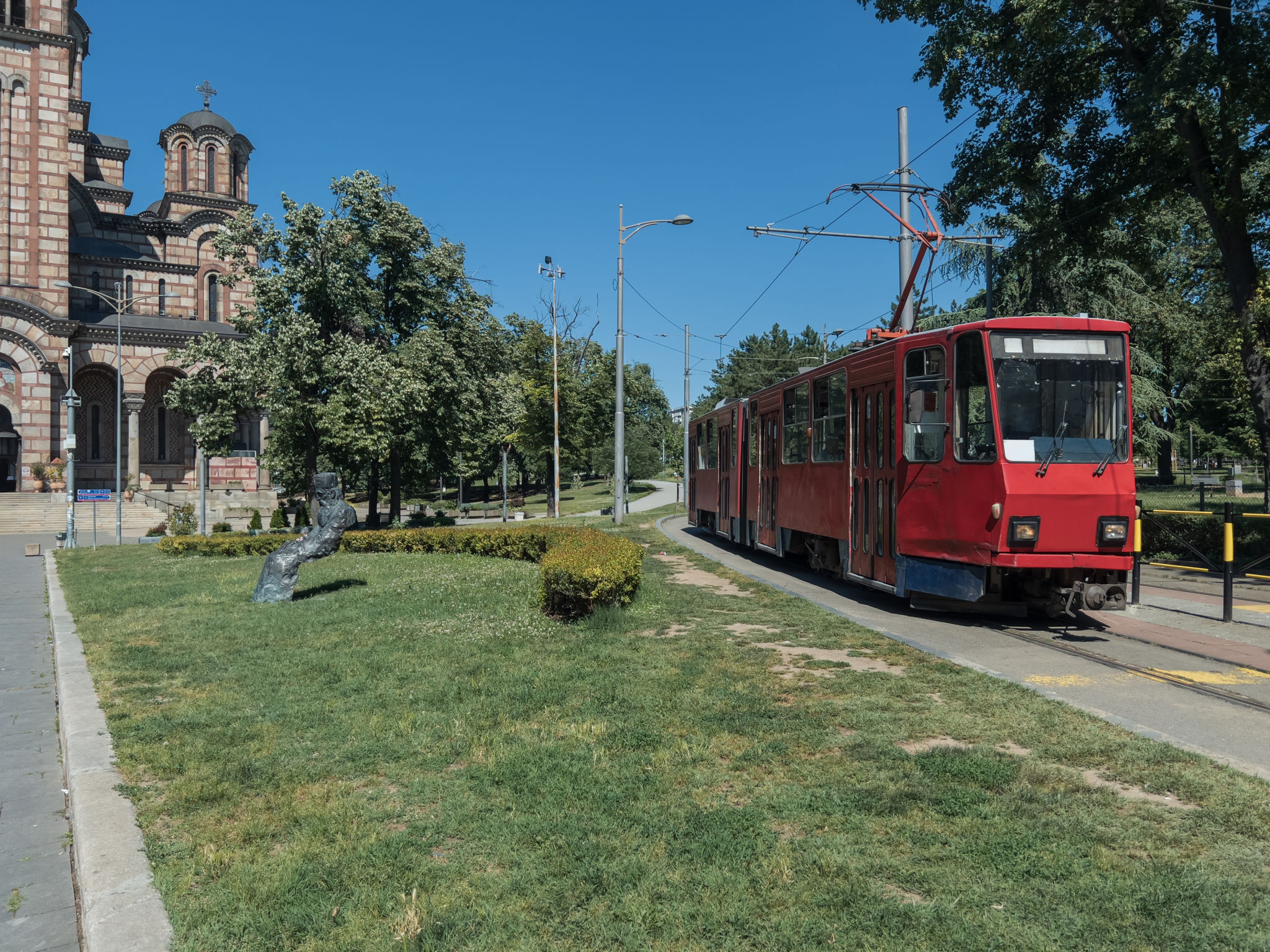 St. Mark's Church or the Church of St. Mark and tram in old historical city center of Belgrade, Serbia at daytime St. Mark's Church or the Church of St. Mark and tram in old historical city center of Belgrade, Serbia at daytime