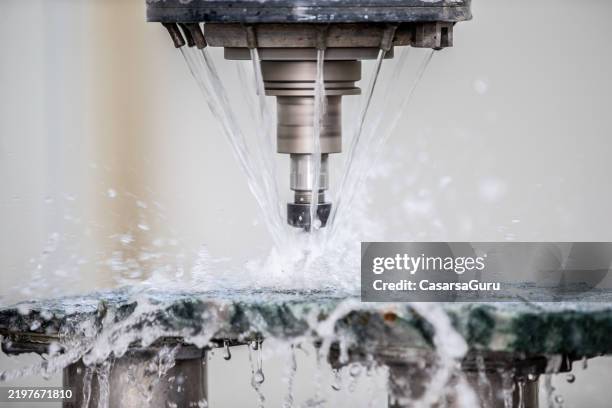 stone shaping using high pressure water jet - fountain stock pictures, royalty-free photos & images
