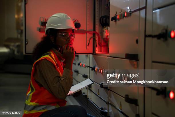 worried industrial service engineer when found damage inside system control cabinet during power outage. - construction mistake stock pictures, royalty-free photos & images