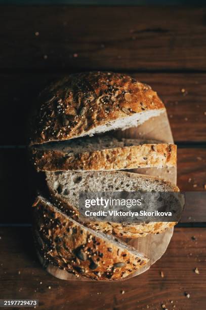bread is the warmest, kindest of all words - trigo integral fotografías e imágenes de stock