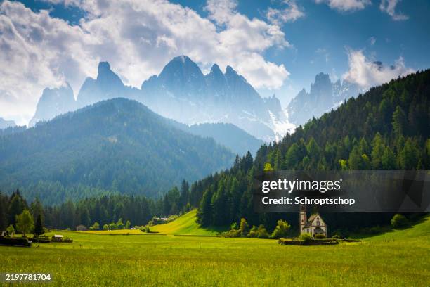 dolomites mountain landscape, santa maddalena church and geislergruppe in val di funes. - bolzano stock pictures, royalty-free photos & images