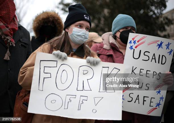 Protesters rally outside of the Theodore Roosevelt Federal Building headquarters of the U.S. Office of Personnel Management on February 05, 2025 in...