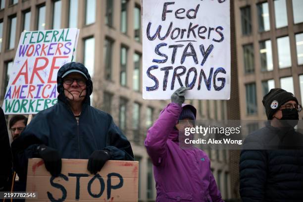 Protesters rally outside of the Theodore Roosevelt Federal Building headquarters of the U.S. Office of Personnel Management on February 05, 2025 in...