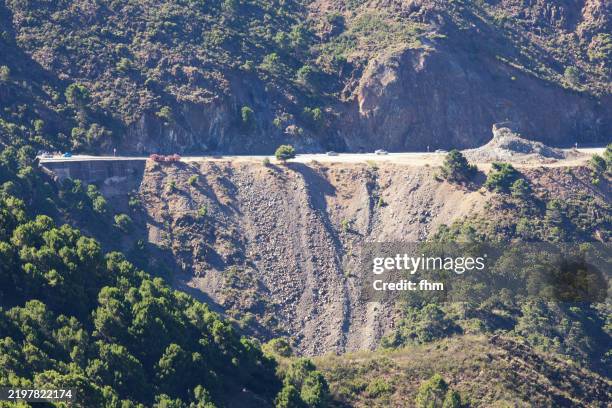 road in the monutains of andalusia - landslide stock pictures, royalty-free photos & images