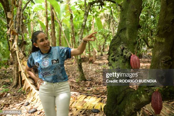 Ecuador's presidential candidate for the Citizen Revolution Movement , Luisa González, gestures as she speaks during an interview with AFP at her...
