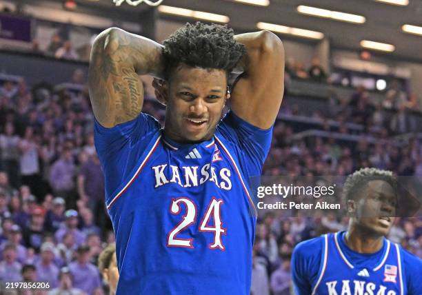 Adams Jr. #24 of the Kansas Jayhawks reacts after a turnover in the first half of a game against the Kansas State Wildcats at Bramlage Coliseum on...