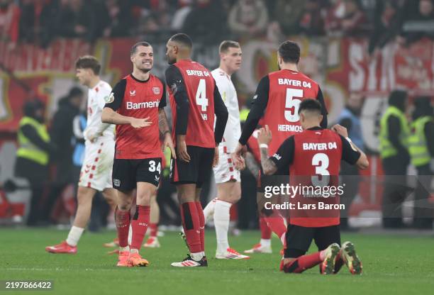 Granit Xhaka of Bayer 04 Leverkusen celebrates his side's victory after the DFB Cup quarterfinal match between Bayer 04 Leverkusen and 1. FC Köln at...