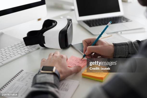 computer programmer working in an office - application developer stock pictures, royalty-free photos & images