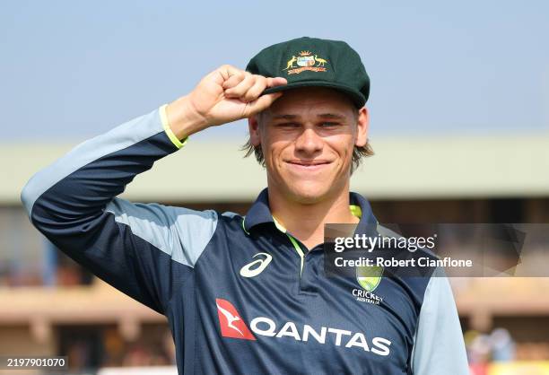 Cooper Connolly of Australia poses with the baggy green after he was named as a debutant during day one of the Second Test match in the series...