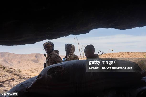 Soldiers with the Puntland Defense Forces spend time at a cave where Islamic State fighters lived until recently being flushed out on the frontline...