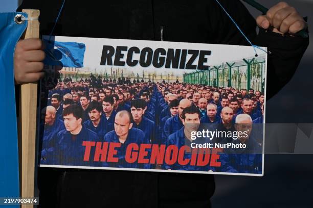 Uyghur activists gather at Violet King Henry Plaza, in front of the Alberta Legislature, during the 'Edmonton for East Turkistan' protest on February...