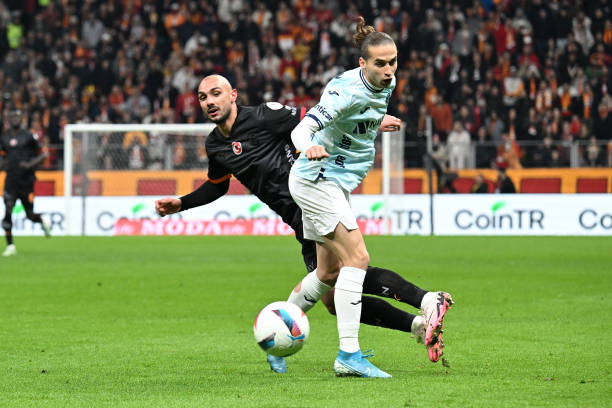 Ahmed Kutucu of Galatasaray and Arda Okan Kurtulan of Adana Demirspor compete during the Turkish Super Lig week 23 match between Galatasaray and...