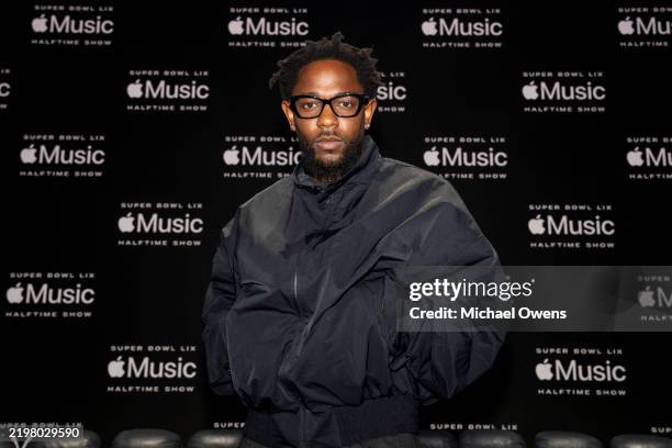 Kendrick Lamar poses for a photo onstage at the Super Bowl LVIX Pregame & Apple Music Super Bowl LVIX Halftime Show Press Conference at Ernest N....