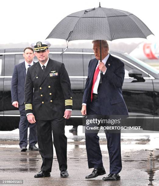 President Donald Trump steps off Air Force One at Naval Air Station Joint Reserve Base New Orleans in Louisiana on February 9, 2025. Trump is in New...