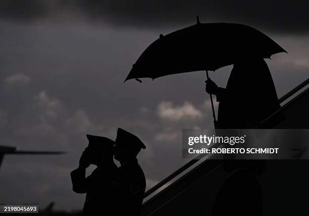 President Donald Trump steps off Air Force One at Naval Air Station Joint Reserve Base New Orleans in Louisiana on February 9, 2025. Trump is in New...