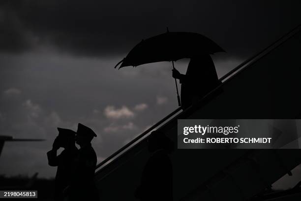 President Donald Trump steps off Air Force One at Naval Air Station Joint Reserve Base New Orleans in Louisiana on February 9, 2025. Trump is in New...