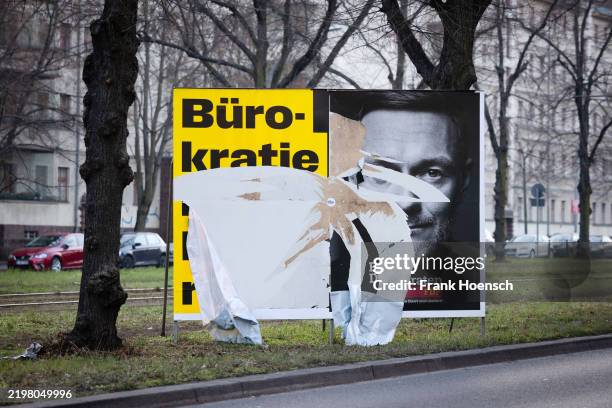 Damaged election poster of the party Freie Demokraten, FDP, with portrait of top candidate Christian Lindner on February 9, 2025 in Berlin, Germany....