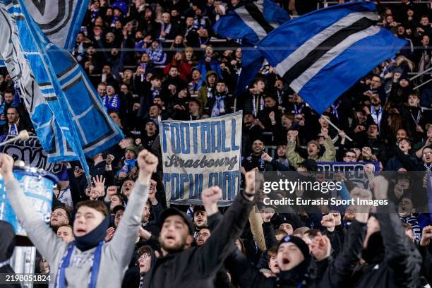 Strasbourg fans celebrates with their team after winning Montpellier during the France Ligue 1 McDonald's match between RC Strasbourg Alsace and...