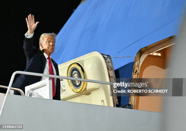 President Donald Trump boards Air Force One at Naval Air Station Joint Reserve Base New Orleans in Louisiana on February 9 as he returns to...