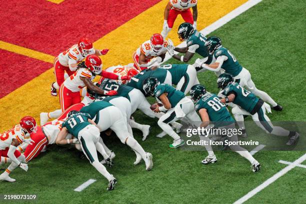 Philadelphia Eagles quarterback Jalen Hurts scores touchdown on a tush push during Super Bowl LIX between the Philadelphia Eagles and the Kansas City...