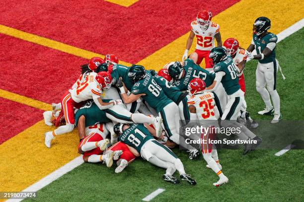 Philadelphia Eagles quarterback Jalen Hurts scores touchdown on a tush push during Super Bowl LIX between the Philadelphia Eagles and the Kansas City...