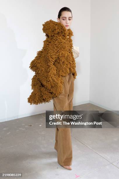 February 8 2025 A model is seen backstage at the Altuzarra fashion show , during New York Fashion Week, February 8, 2025.