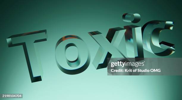 glossy transparent "toxic" text with a mysterious atmosphere - tóxico concepto social fotografías e imágenes de stock