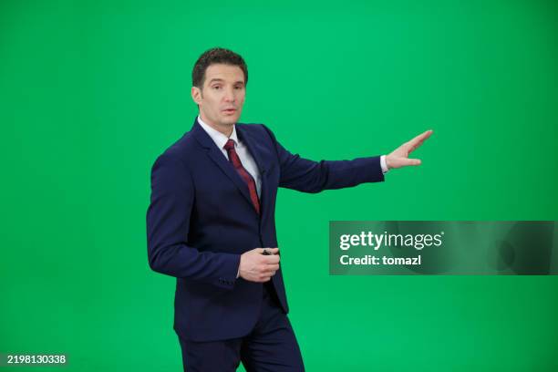 weather forecaster on green background - weather forecaster stock pictures, royalty-free photos & images