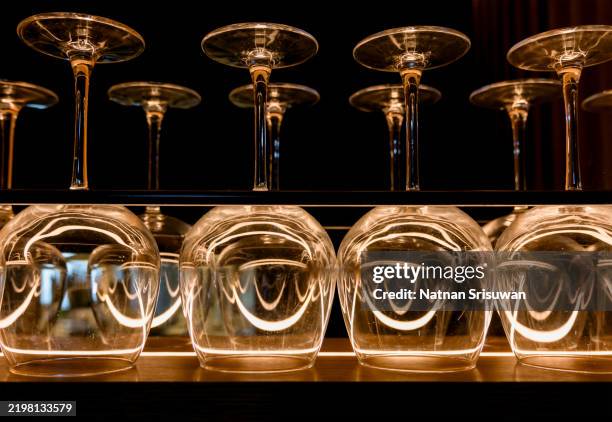 restaurant table with wine glasses, table set up for dinner. - wine bar foto e immagini stock