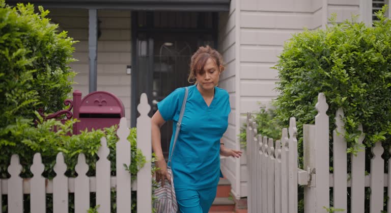 https://media.gettyimages.com/id/2198135324/video/young-female-nurse-leaving-home-in-scrubs-preparing-for-a-workday.jpg?b=1&s=640x640&k=20&c=lzB-kllR2P1U8goakTA8mB8PtoNFoTTA_XsgRtkZXSA=
