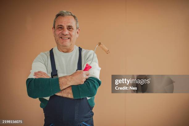 portrait of a smiling painter - decorating stock pictures, royalty-free photos & images