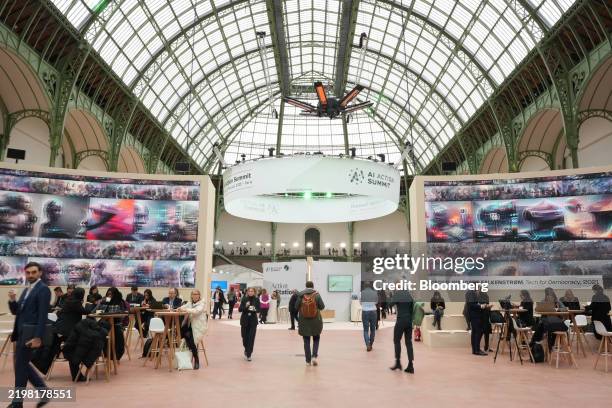 Attendees at the AI Action Summit in Paris, France, on Monday, Feb. 10, 2025. France is set to announce a total of 109 billion in investment in...